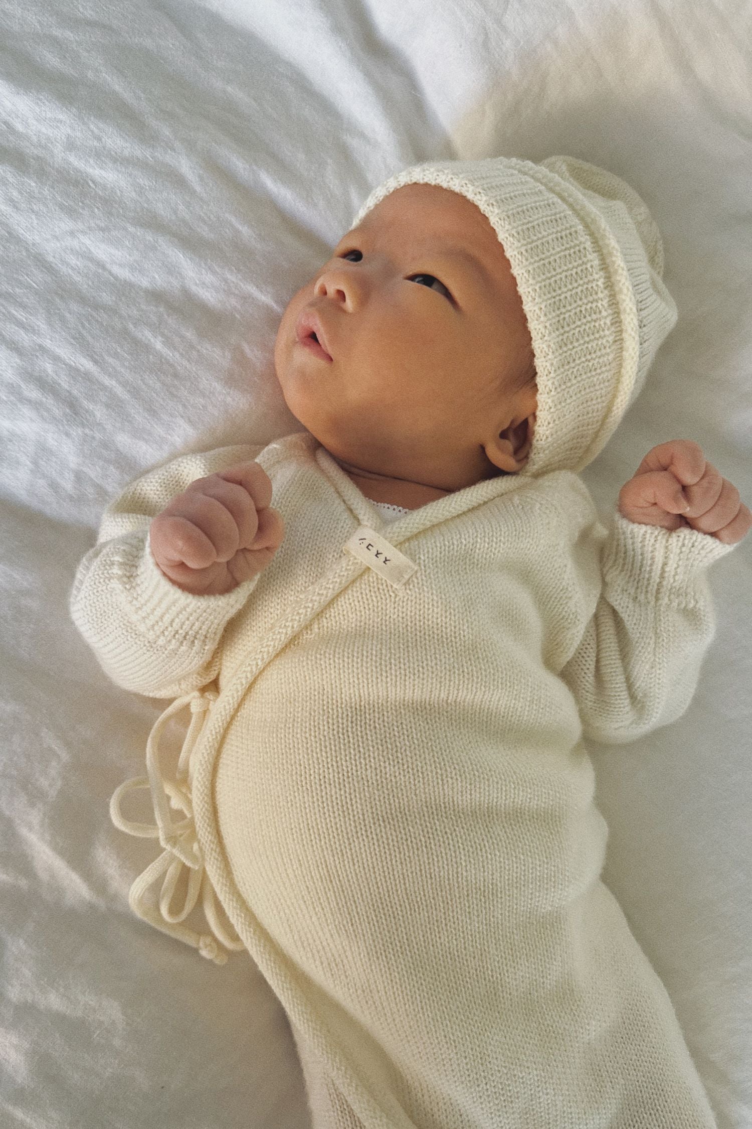 Merino Knit Baby Beanie. Milk